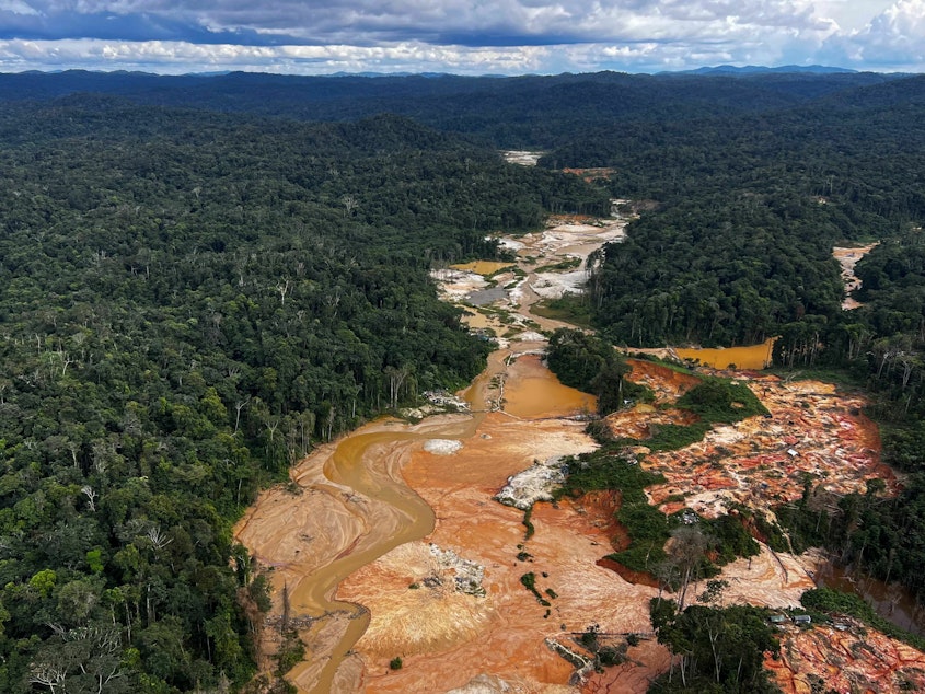 caption: An aerial picture shows an illegal mining camp during an operation by the Brazilian Institute of Environment and Renewable Natural Resources against Amazon deforestation at the Yanomami territory in Roraima state, Brazil, on Feb. 24.