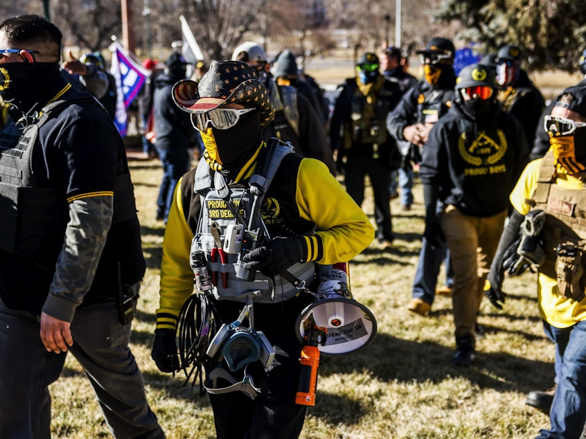 caption: Public Safety Canada is calling the Proud Boys a terrorist group, noting that last month, its members "played a pivotal role in the insurrection at the U.S. Capitol." Here, Proud Boys members join Donald Trump supporters at a protest outside the Colorado State Capitol in Denver.