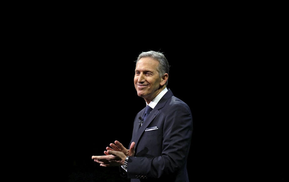caption: FILE: Starbucks CEO Howard Schultz pauses as he speaks to applaud employees at the Starbucks annual shareholders meeting Wednesday, March 22, 2017, in Seattle. 
