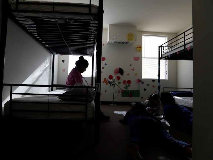 caption: A holding center for migrant children in Carrizo Springs, Texas. A 16-year-old Honduran boy who entered the U.S. alone was scheduled to be deported Wednesday, but a federal judge has blocked his removal.