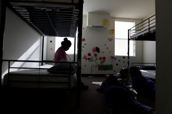 caption: A holding center for migrant children in Carrizo Springs, Texas. A 16-year-old Honduran boy who entered the U.S. alone was scheduled to be deported Wednesday, but a federal judge has blocked his removal.