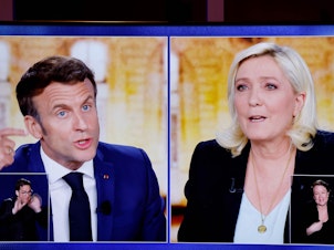 caption: A wide gulf exists between the policies of French President Emmanuel Macron and far-right candidate Marine Le Pen. The two face off Sunday, in the second round of France's national election.