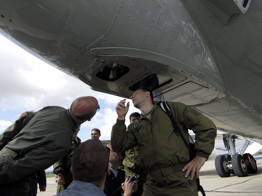 caption: Open Skies would be the third major international military pact Trump has withdrawn the U.S. from. This photo from 2007 shows Czech soldiers inspecting cameras on a U.S. Boeing plane at a military airbase in Pardubice, Czech Republic, as part of the agreement.