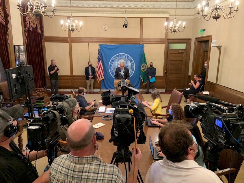 caption: Gov. Jay Inslee speaking during press conference Aug. 18 announcing a vaccine mandate for people who work in K-12.