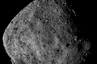 caption: This image of Bennu, taken from a range of 15 miles, shows its unexpectedly rough and rocky surface.