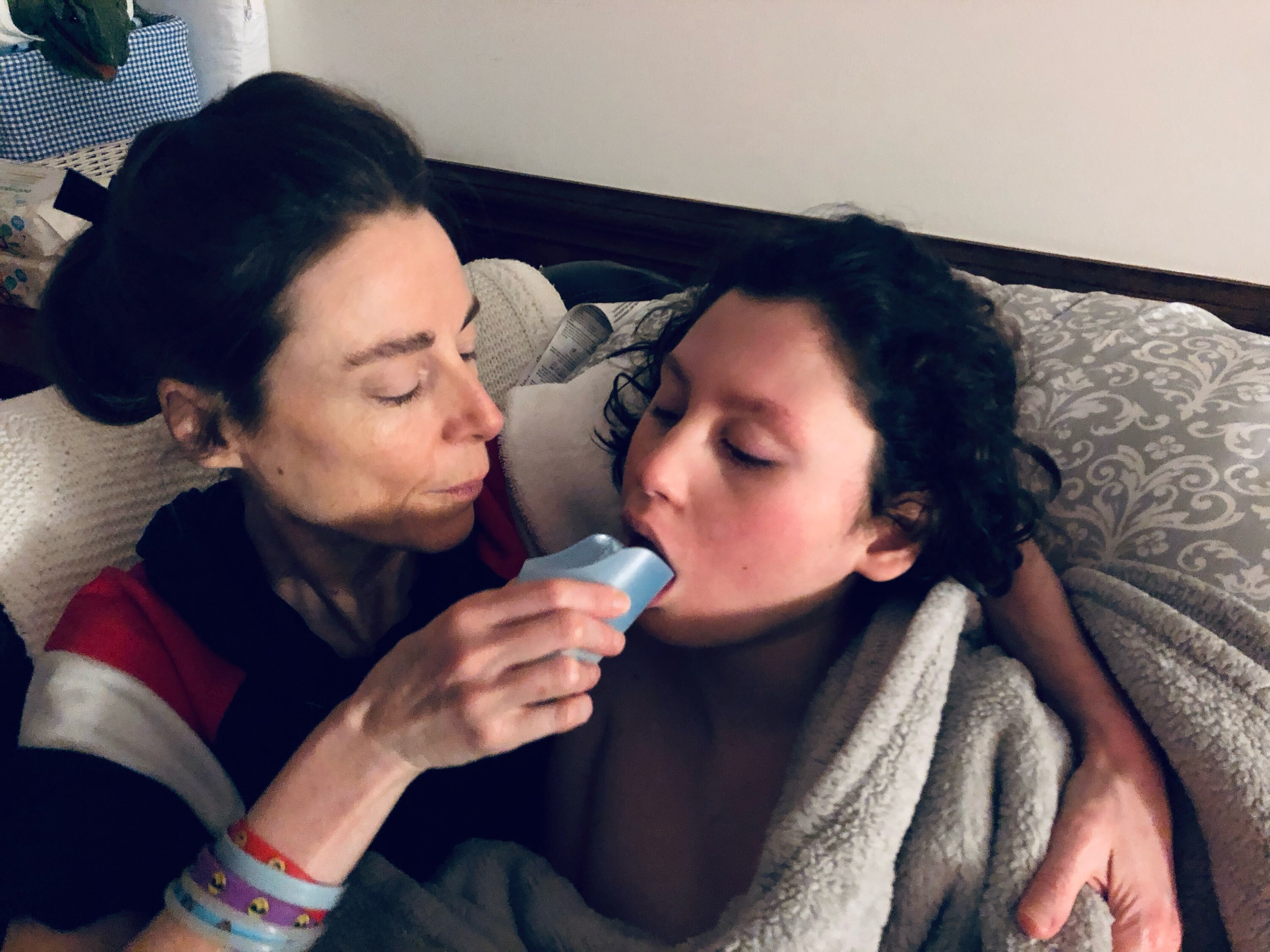 caption: Alessandra Fabrello (left) cares for her son Ysadore Maklakoff. North Carolina Medicaid cuts that went into affect Oct. 1 mean Fabrello will have a pay cut as a family caregiver. Maklakoff qualifies for services he can't get because providers already didn't take Medicaid's low reimbursement rates.