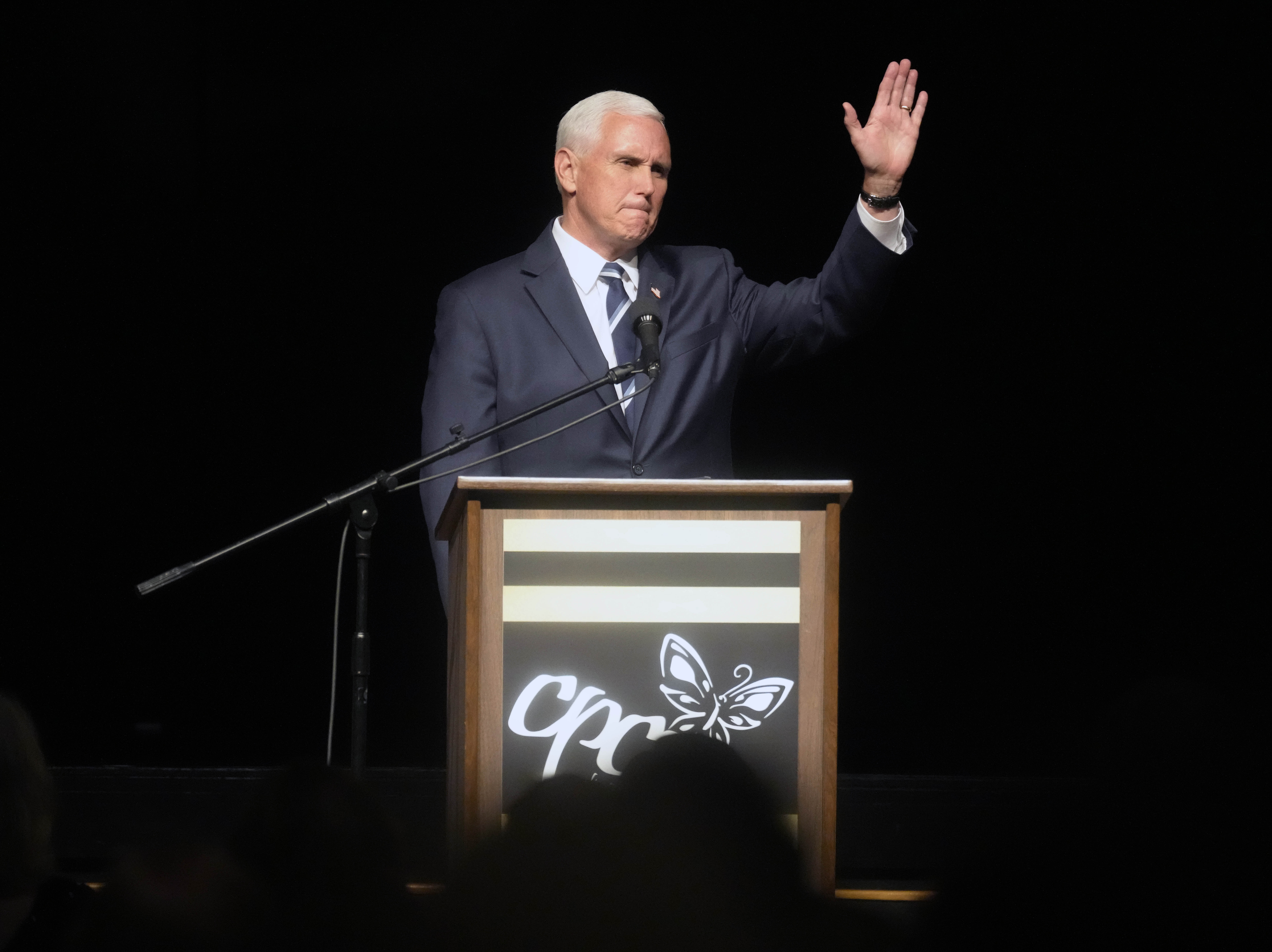 caption: Former Vice President Mike Pence speaks at a fundraiser for Carolina Pregnancy Center on May 5 in Spartanburg, S.C. Pence will campaign with Georgia's incumbent Republican Gov. Brian Kemp the day before this month's GOP primary in his most significant political beak with former President Donald Trump to date.