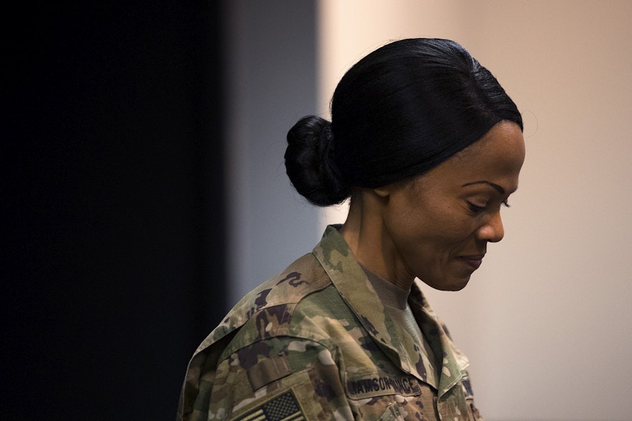 caption: Col. Hope Williamson-Younce, commander of the 627th Hospital Center, speaks during a press conference on Tuesday, March 31, 2020, at the CenturyLink Field Event Center in Seattle. “Within 48 hours of notification, we answered the nations call," said Col. Williamson-Younce. "We have medical doctors, nurses and support staff from all over the nation. They have mobilized in a moment’s notice to support our brothers and sisters here in Seattle, Washington.” 
