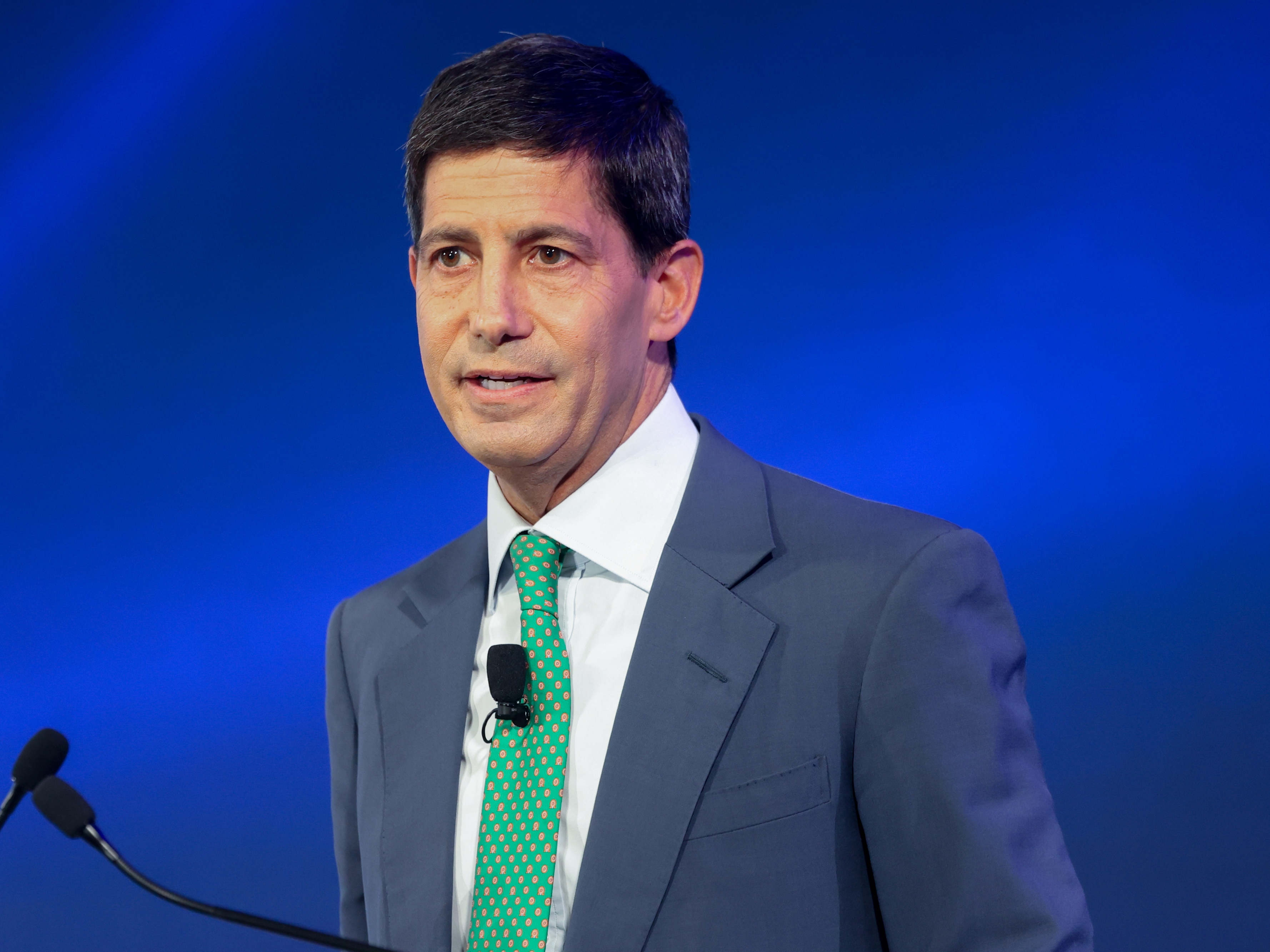 caption: Kevin Warsh speaks during the International Monetary Fund and World Bank spring meetings at the IMF headquarters in Washington, D.C., on April 25, 2025.