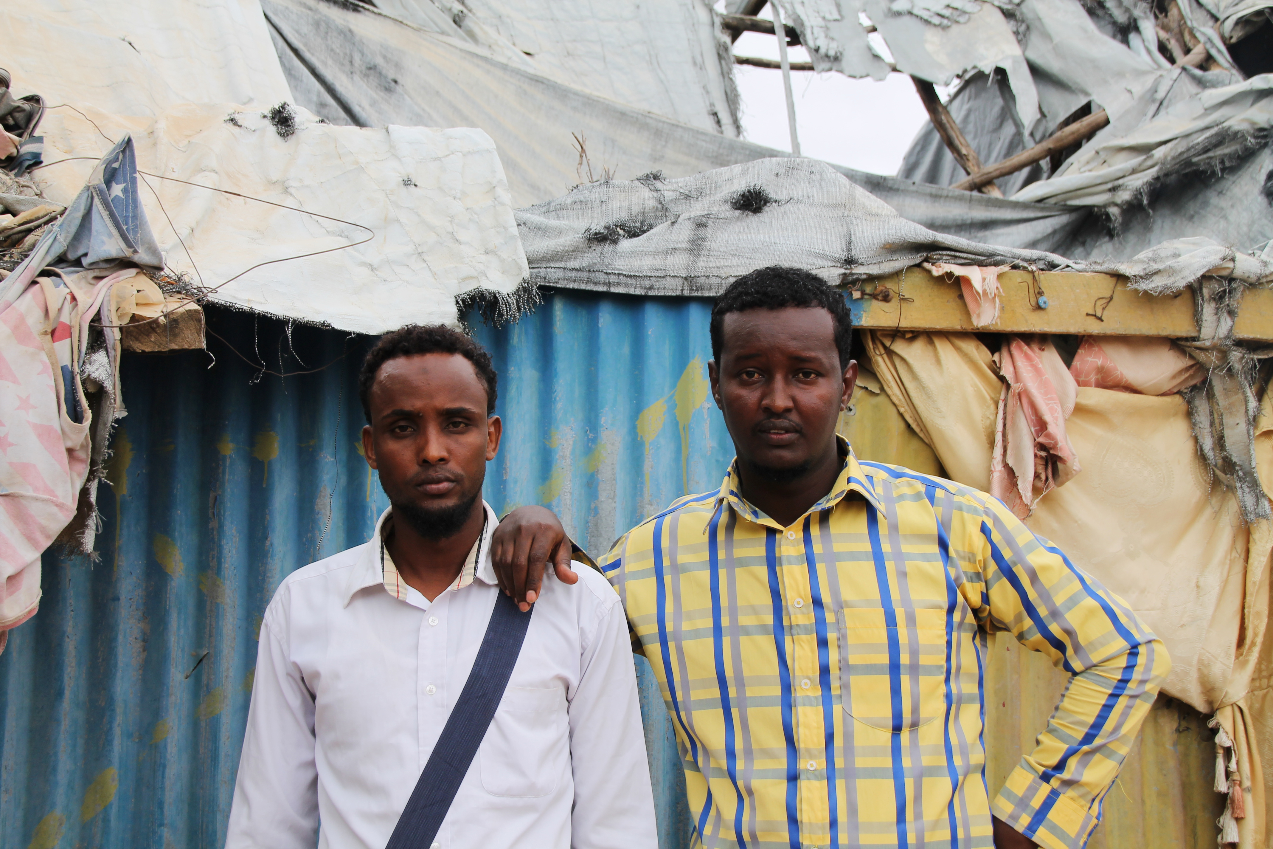 caption: Salam Abdi Hadul and Mohamed Abdi in Dadaab refugee camp