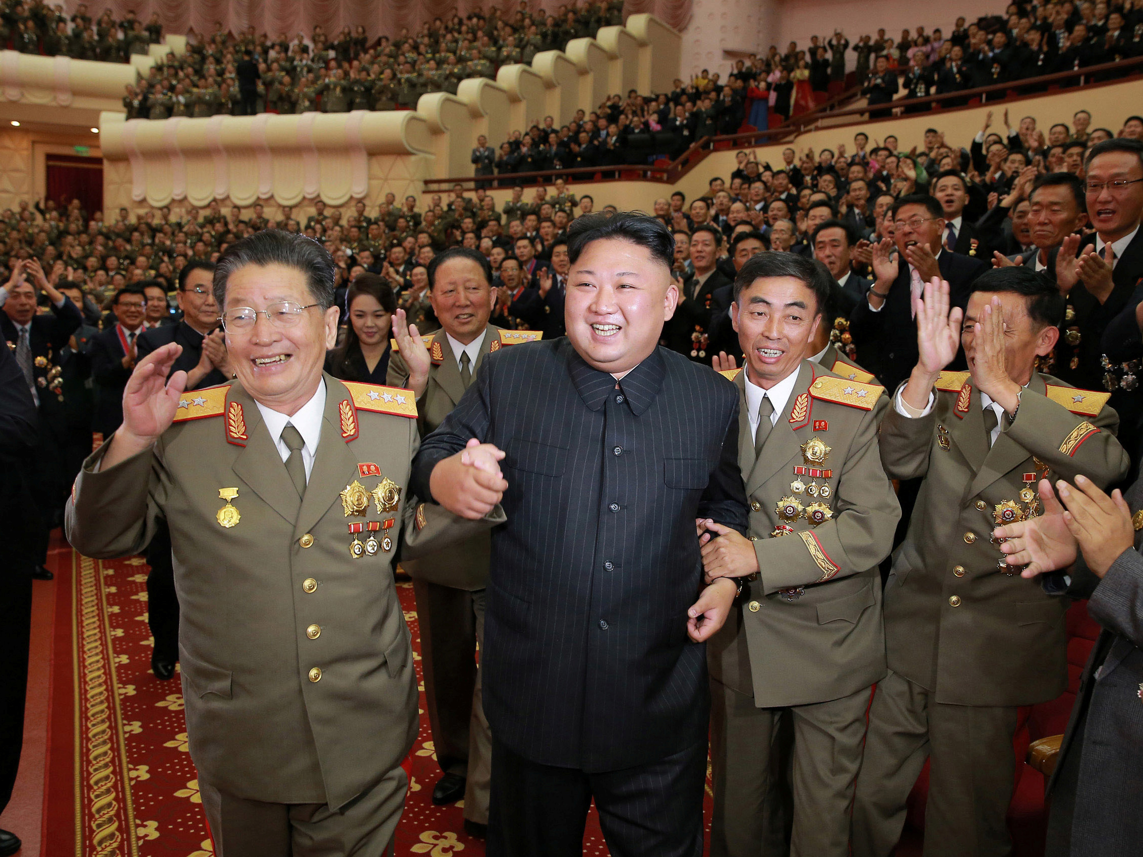 caption: North Korean leader Kim Jong Un at a celebration for scientists and engineers who contributed to the nation's latest nuclear test.