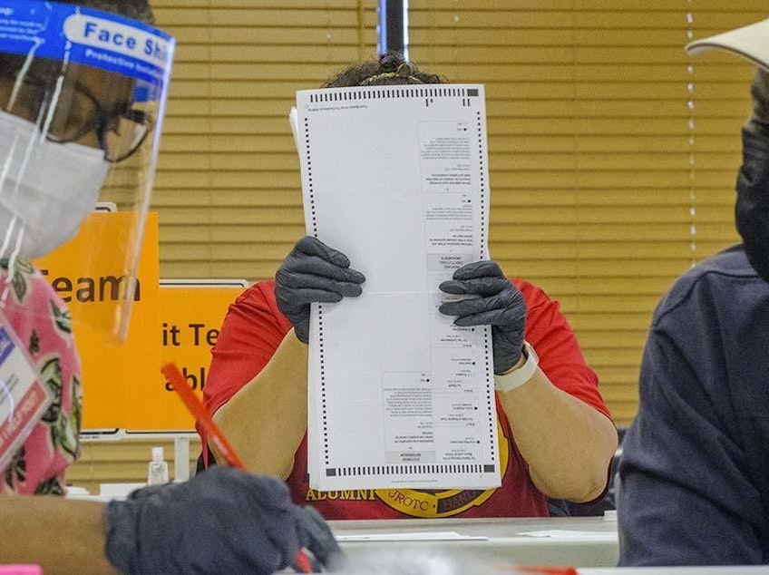 caption: Fourteen auditors began the manual recount of around 71,000 presidential ballots in Macon, Ga., Friday, part of a statewide recount of about 5 million votes cast statewide.