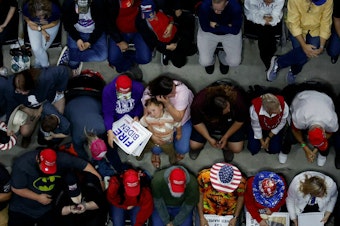 caption: Supporters of former President Donald Trump attend a campaign rally at the Forum River Center March 9 in Rome, Ga.