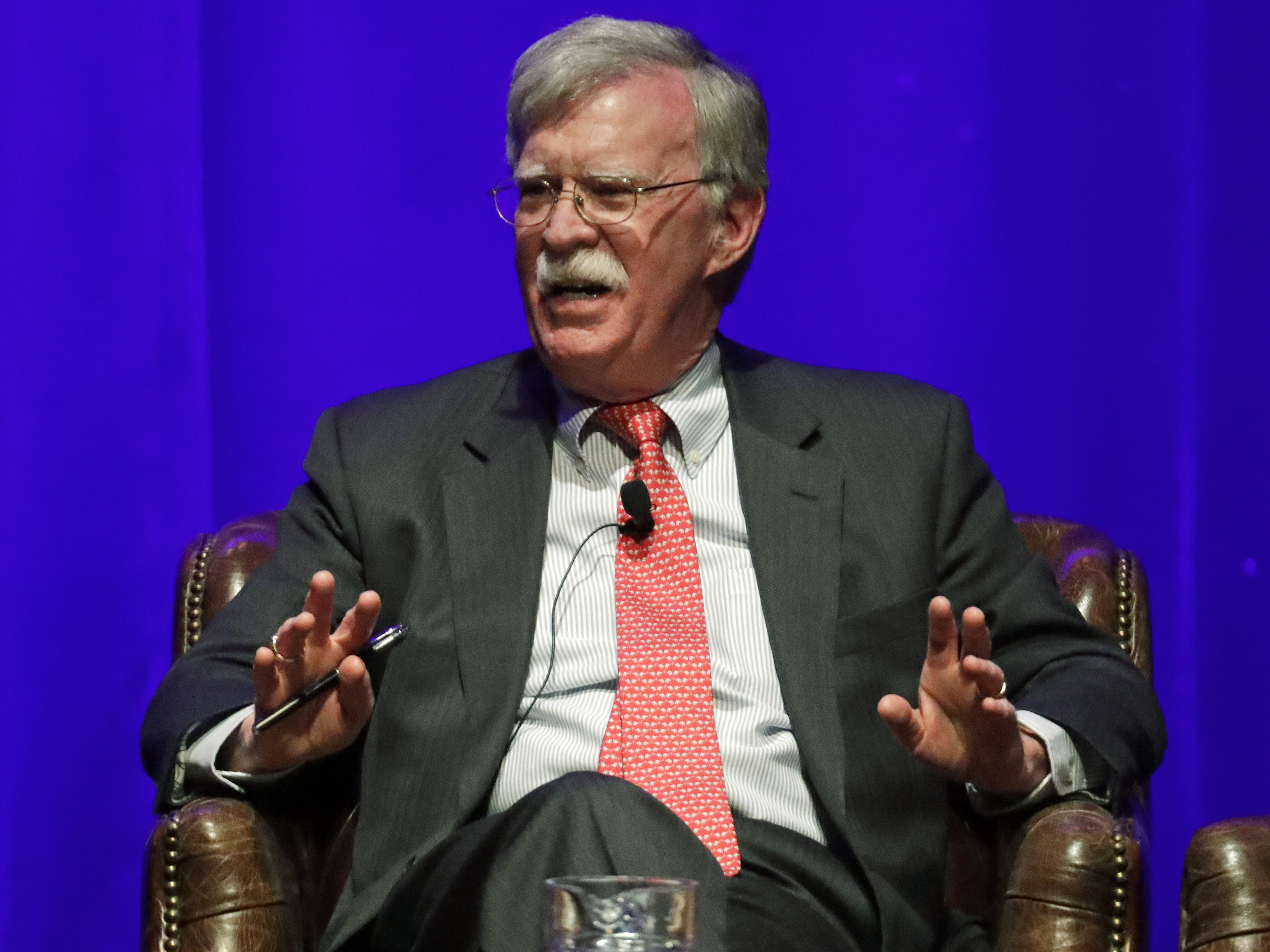 caption: Former national security adviser John Bolton paints a critical portrait of President Trump in a new memoir set for publication soon.