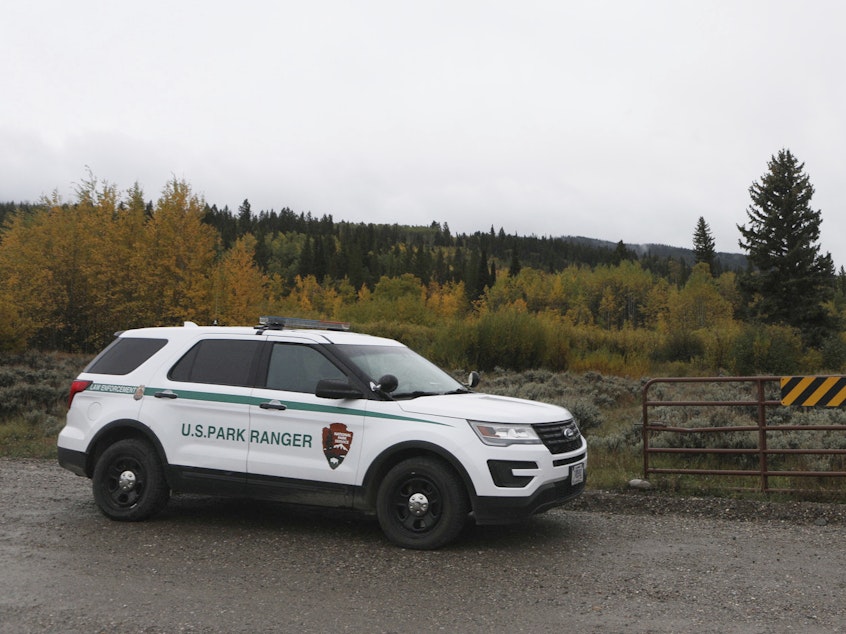 caption: A U.S. Park Ranger vehicle drives in the Spread Creek area in the Bridger-Teton National Forest, just east of Grand Teton National Park off U.S. Highway 89, on Sunday, in Wyoming. Authorities say they have found a body believed to be Gabrielle "Gabby" Petito, who went missing on a trip with her boyfriend.