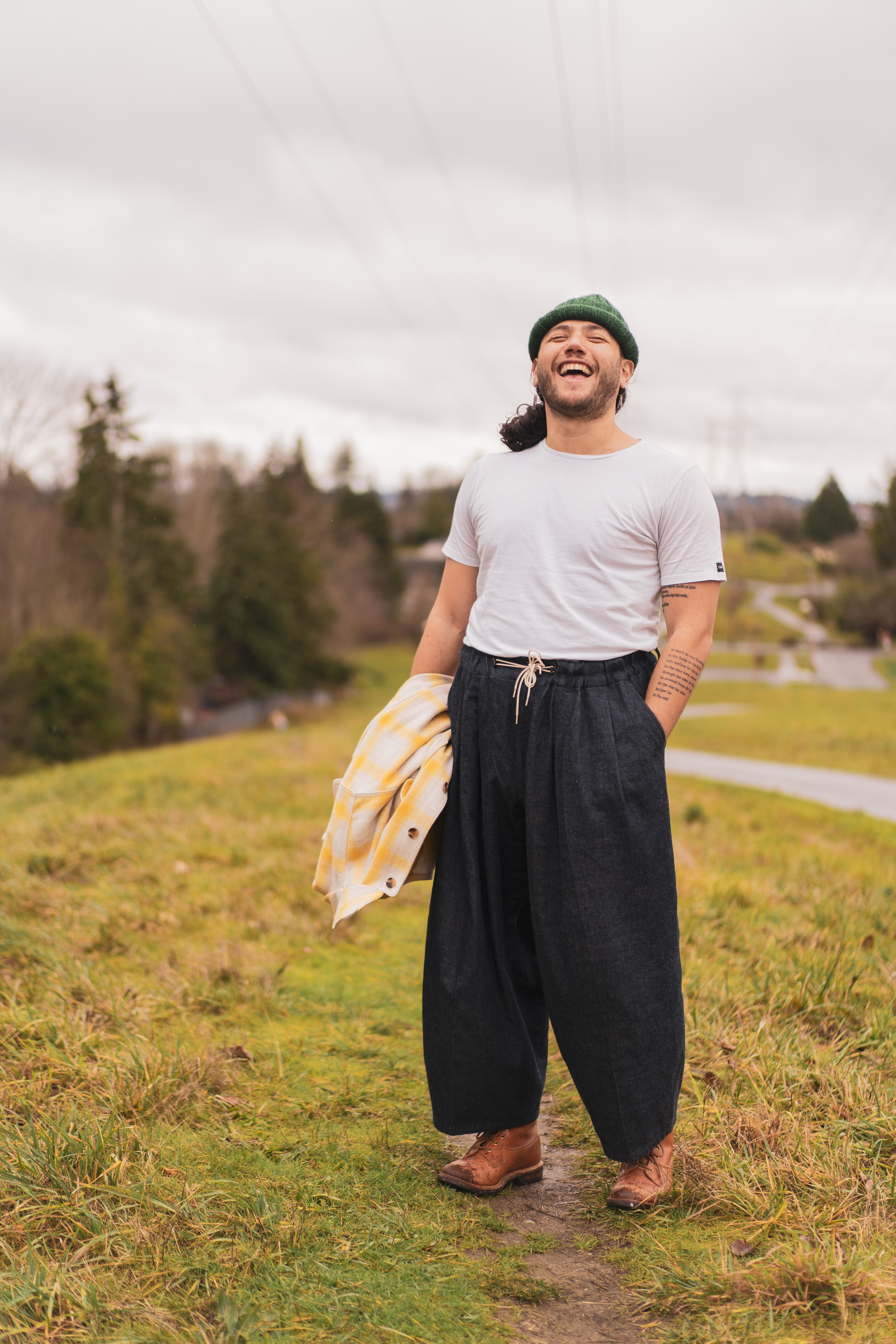 caption: Seattle Civic Poet Dujie Tahat in Seattle's Beacon Hill neighborhood