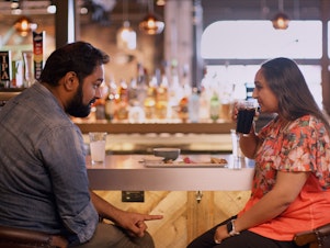 caption: Is it a match? A potential couple meet up courtesy of a matchmaker in the Netflix series <em>Indian Matchmaking.</em>