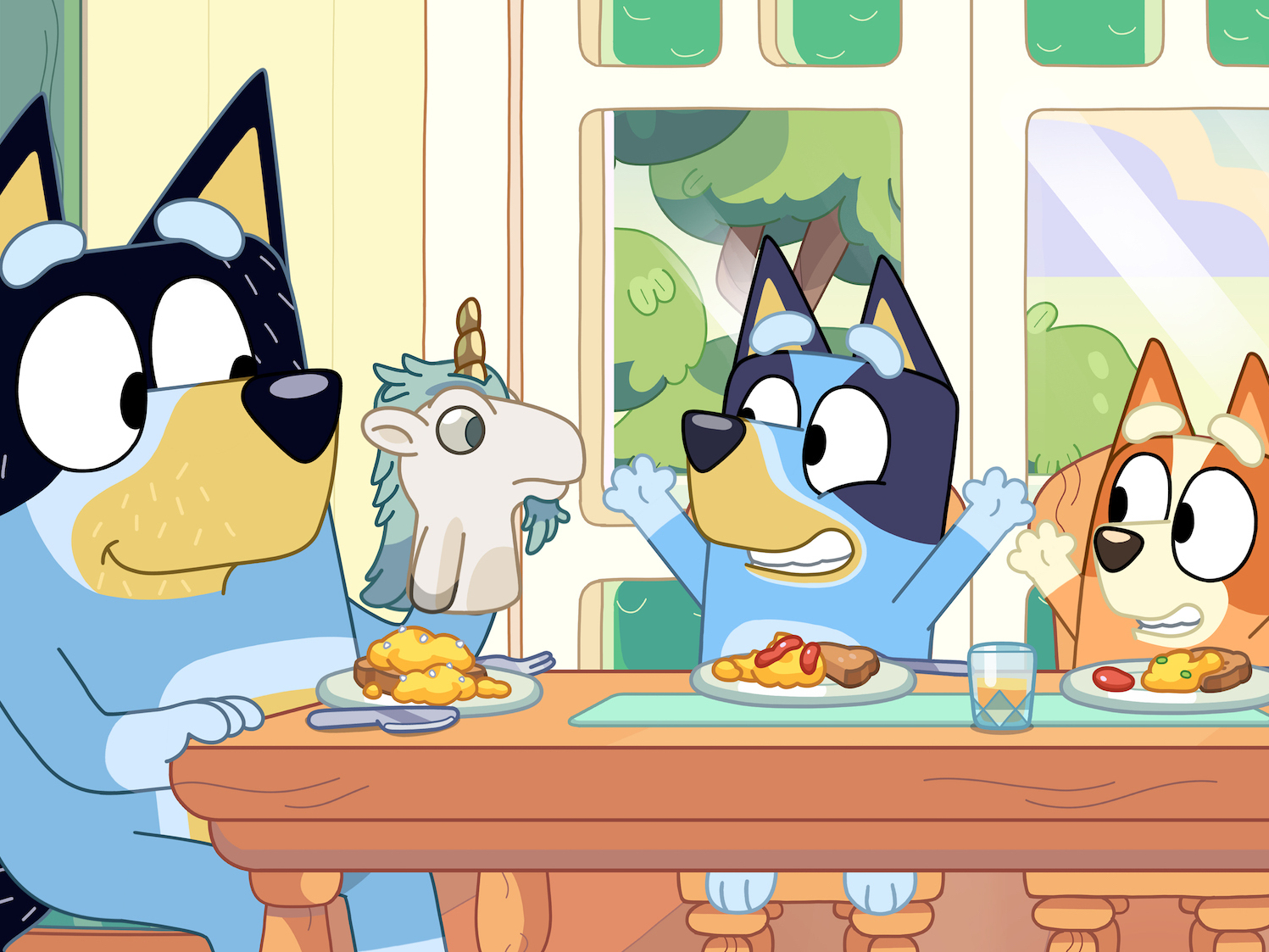 caption: Bandit (left) with his daughters Bluey (center) and Bingo (right).