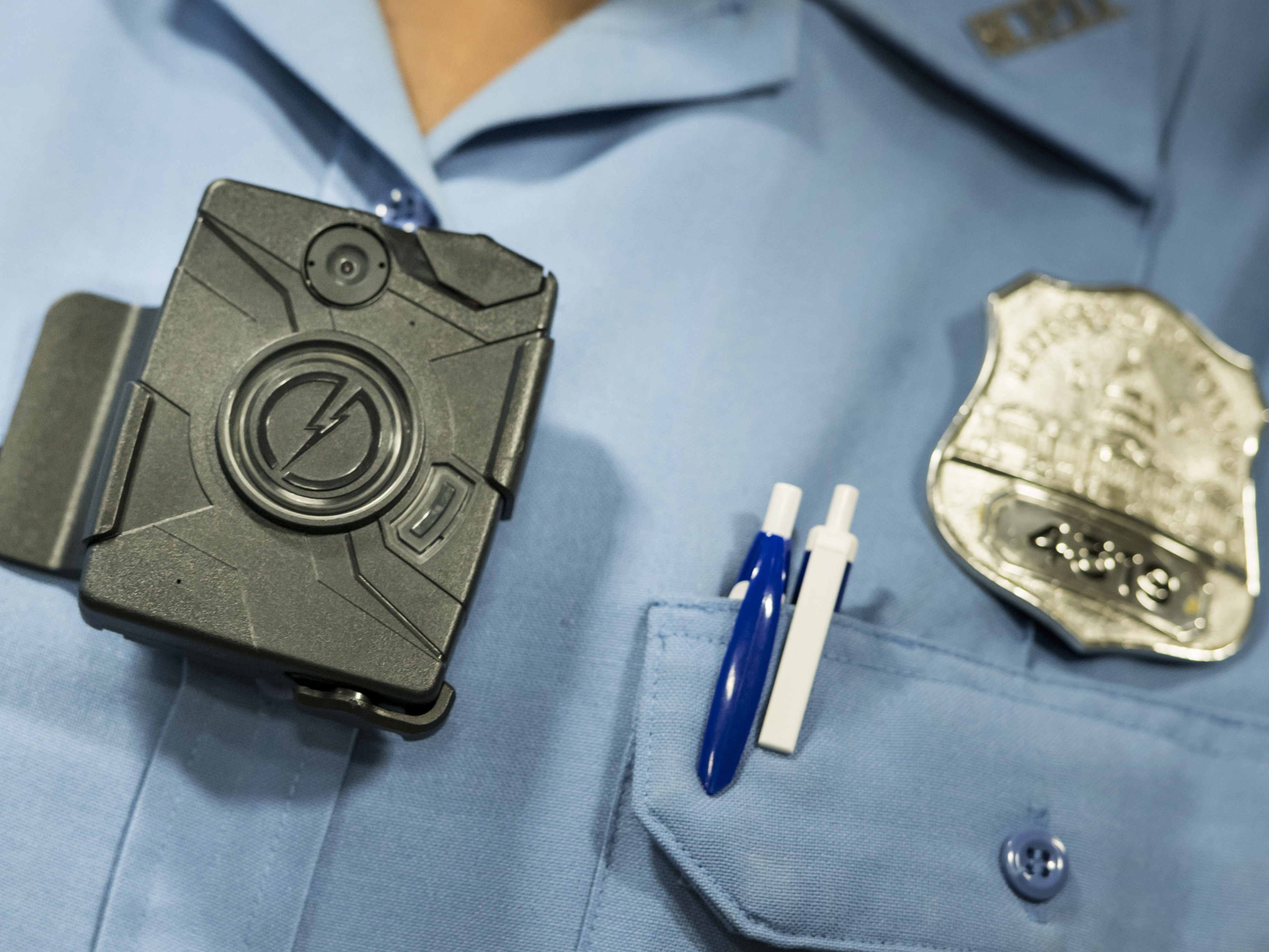 caption: A body camera from Taser is seen during a press conference on Sept. 24, 2014 in Washington, DC.