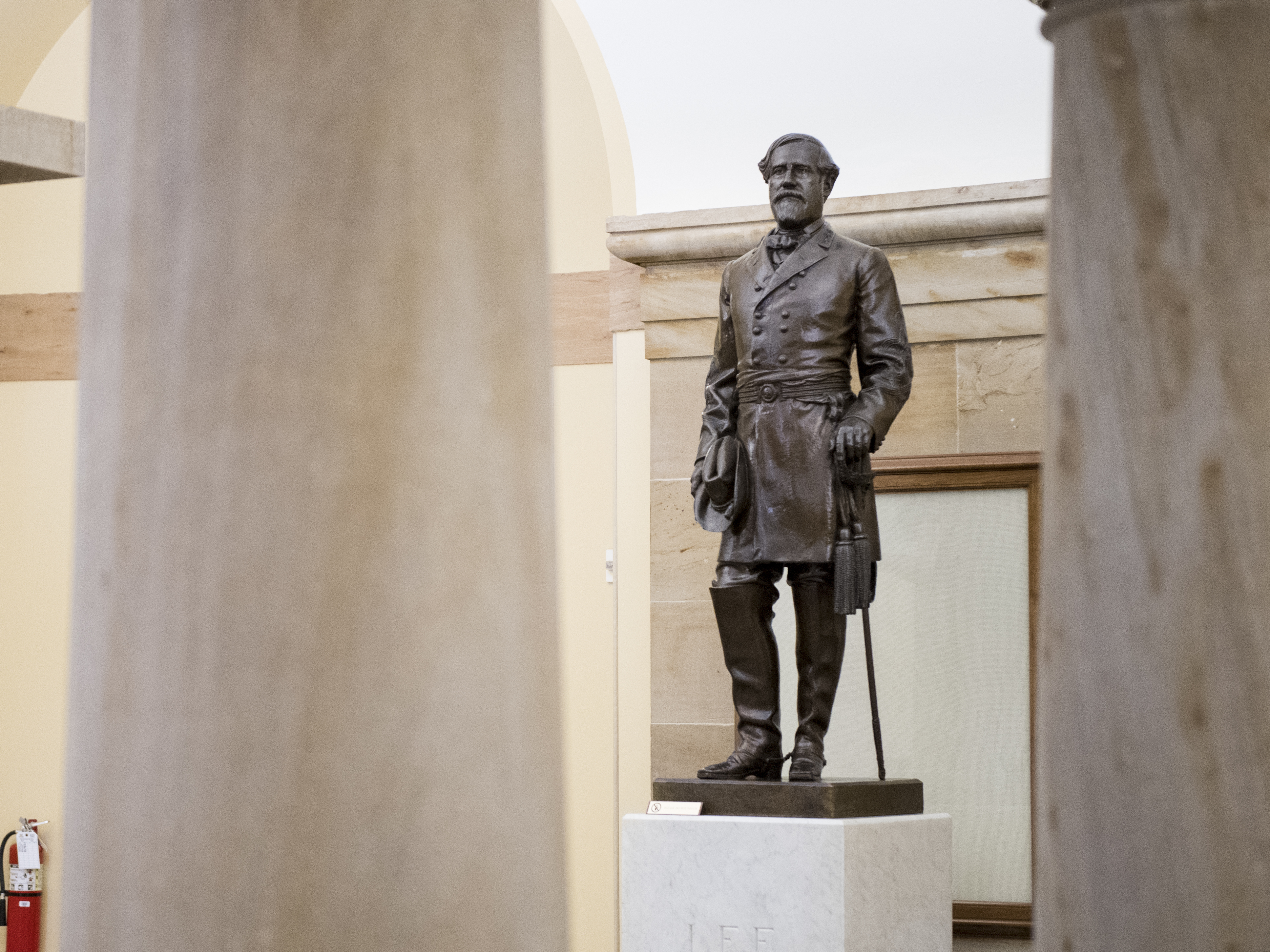 caption: A statue of Robert E. Lee stands in the U.S. Capitol, seen in 2019.