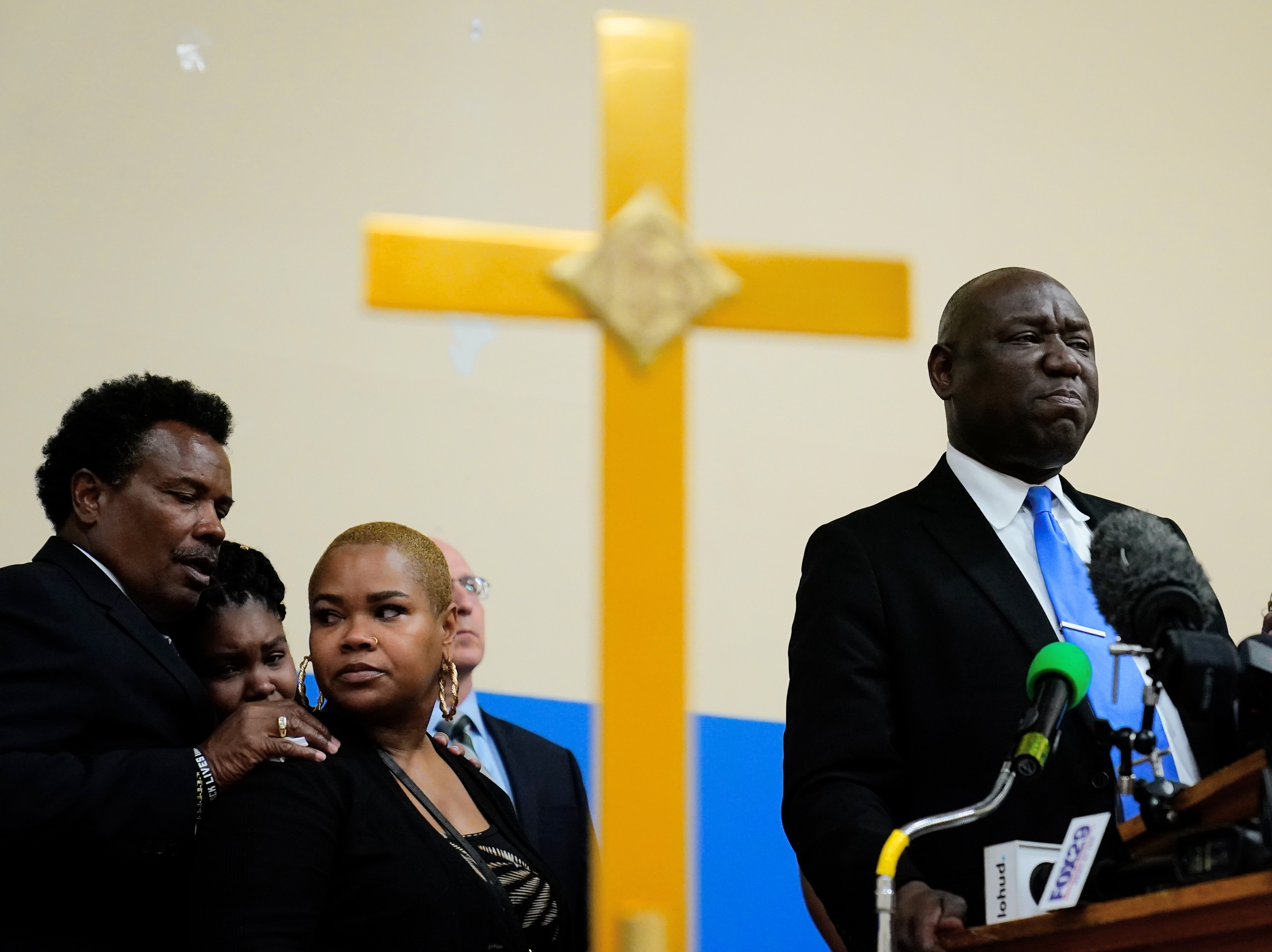 caption: Attorney Benjamin Crump, accompanied by the family of Ruth Whitfield, a victim of shooting at a supermarket, speaks with members of the media during a news conference in Buffalo, N.Y., on Monday.