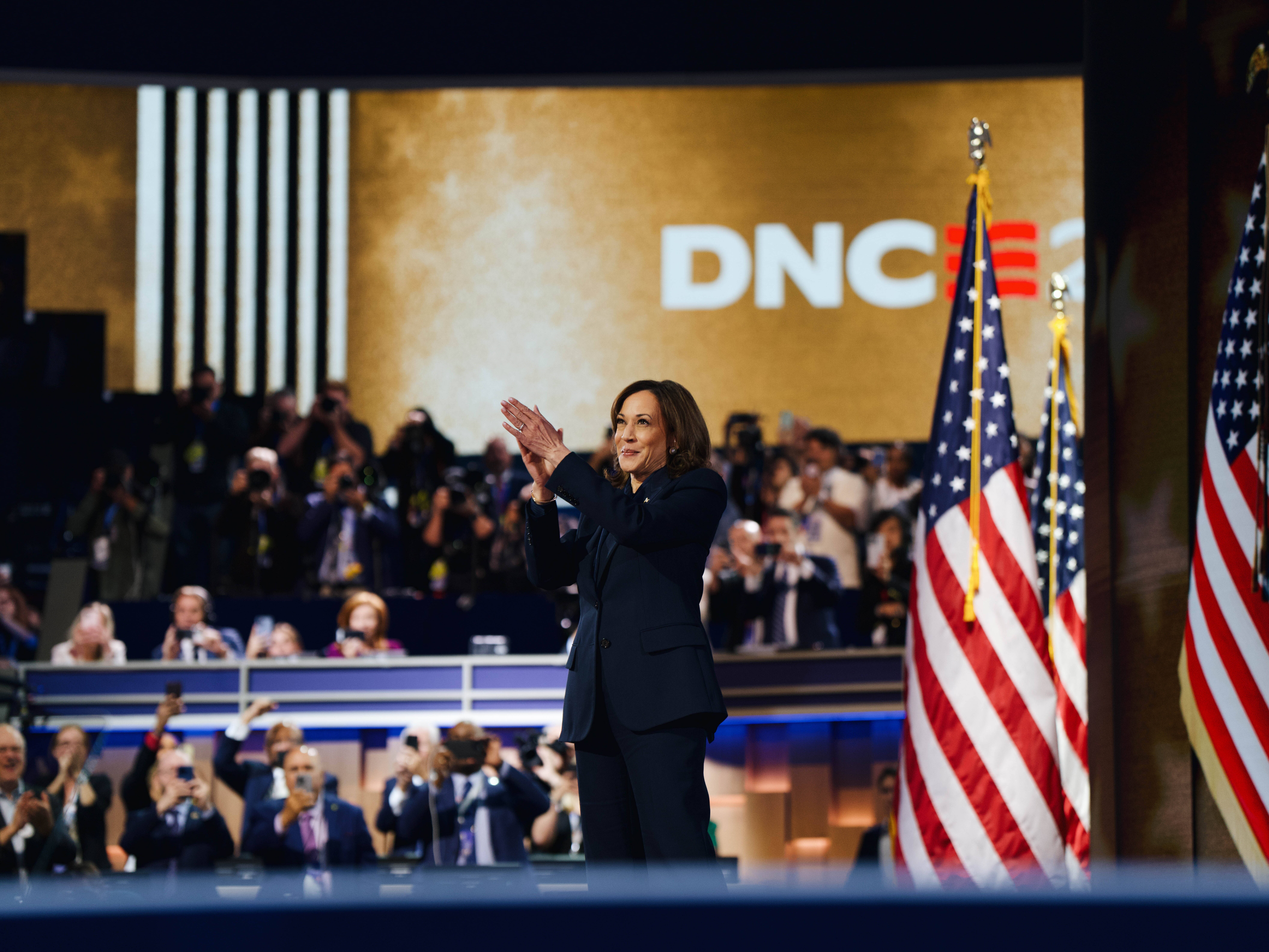 caption: Kamala Harris accepts her nomination on the final night of the DNC.