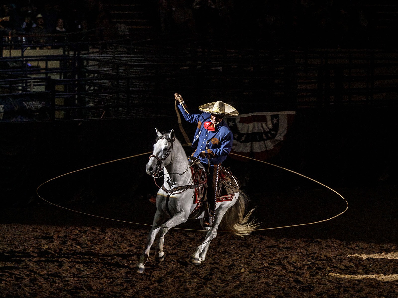 caption: Gerardo "Jerry" Diaz, a fourth-generation charros from New Braunfels, Texas, performs at the National Western Stock Show and Rodeo on Jan. 8, 2023.