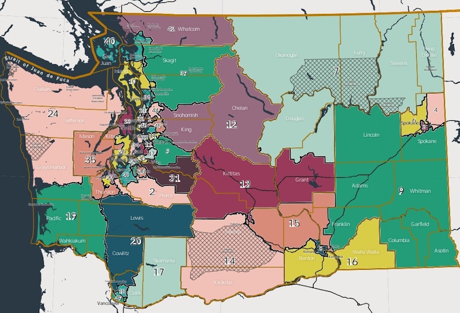 caption: The 2021 map. Judge Lasnik previously said district boundaries in this version diluted the voting power of the Latino community in the Yakima Valley area, violating the federal Voting Rights Act. He decided this map would need to be redrawn. The new map appears at the top of this post. 