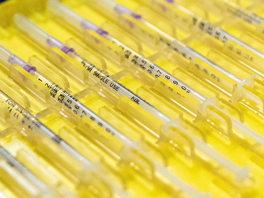 caption: Syringes filled with the Novavax COVID-19 vaccine were prepared for use at a vaccination center in Berlin, Germany, in February. Soon the vaccine could become available in the U.S.
