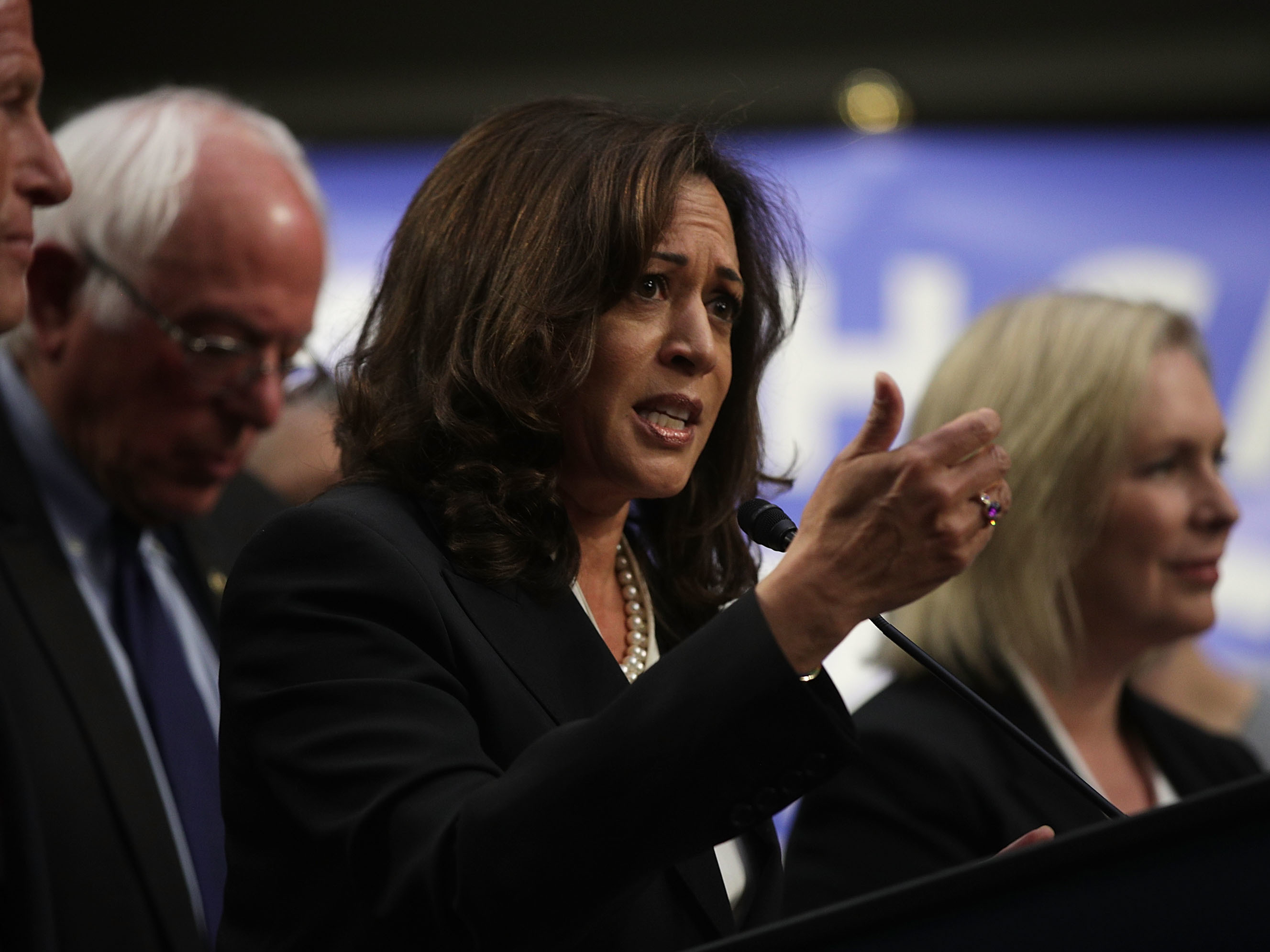 caption: Sen. Kamala Harris, D-Calif., co-sponsored Vermont Sen. Bernie Sanders' "Medicare for All" bill, along with several other 2020 candidates, when it was released in 2017. Her plan has some key differences from Sanders', including a larger role for private insurance and a higher threshold for taxing household income.