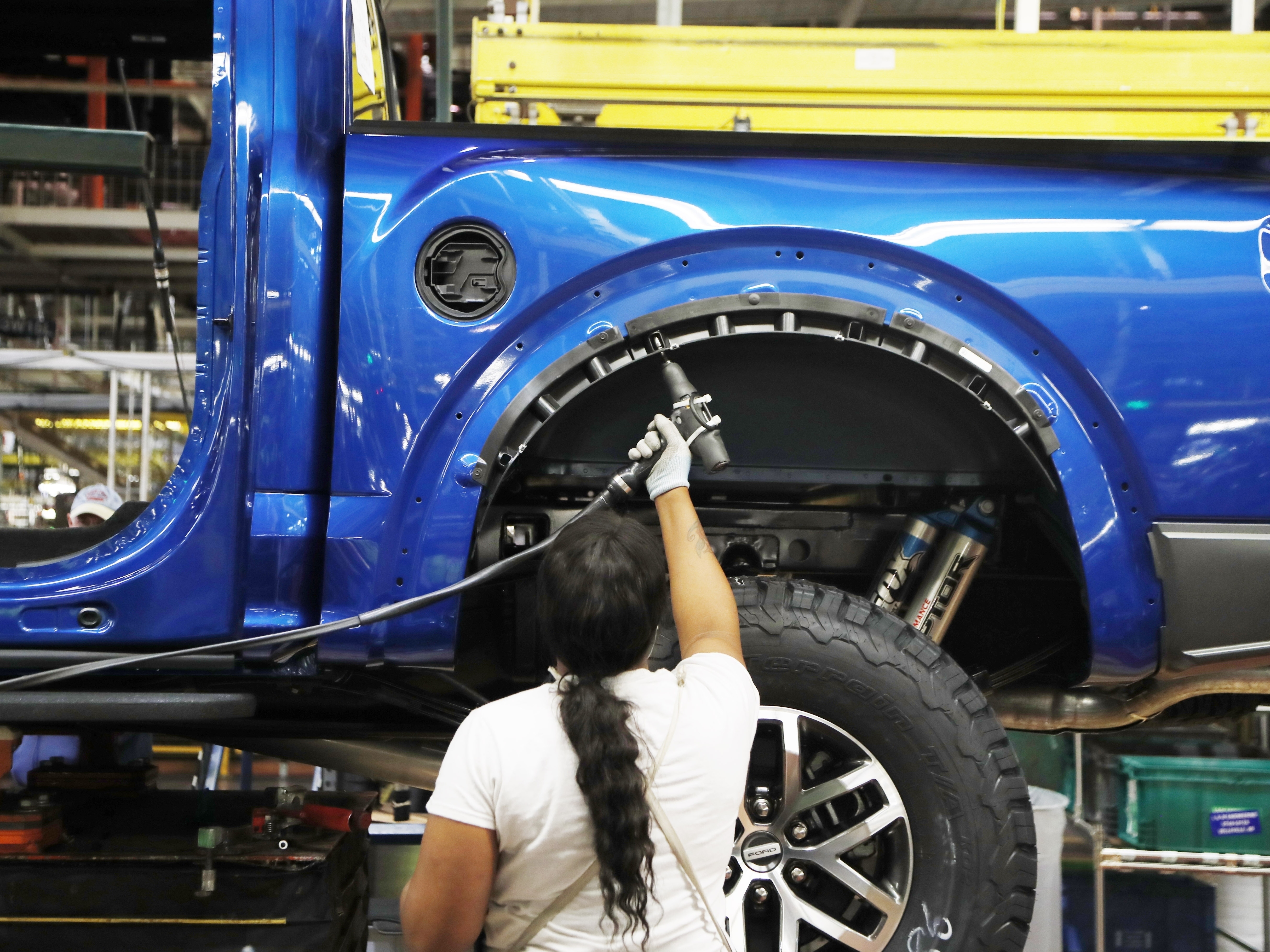 caption: The manufacturing sector has seen a slowdown amid the continuing U.S. trade war with China.