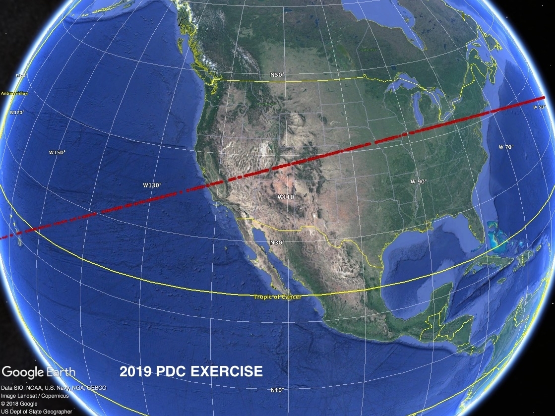 caption: A stripe of red dots shows the risk corridor for a hypothetical asteroid strike, part of an exercise this week held by planetary defense experts in which they analyze data about a fictitious asteroid.