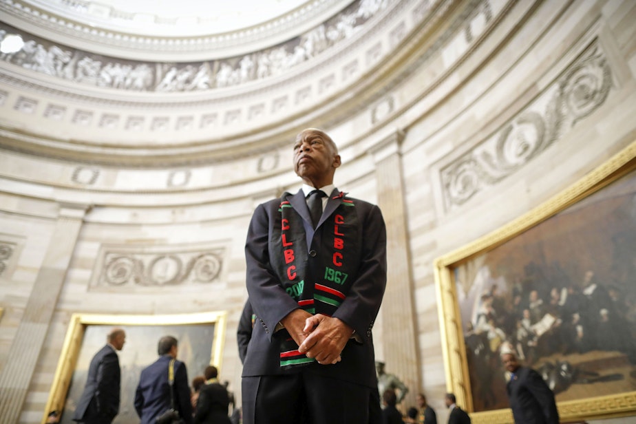 caption: Rep. John Lewis, D-Ga., and other members of the Congressional Black Caucus as they wait to enter as a group to attend the memorial services for Rep. Elijah Cummings, D-Md., at the U.S. Capitol in Washington, Thursday, Oct. 24, 2019. (Pablo Martinez Monsivais/AP Photo)