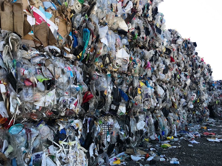caption: A wall of plastic trash at Garten Services in Salem, OR., headed to the landfill. The vast majority of plastic can't be or won't be recycled.