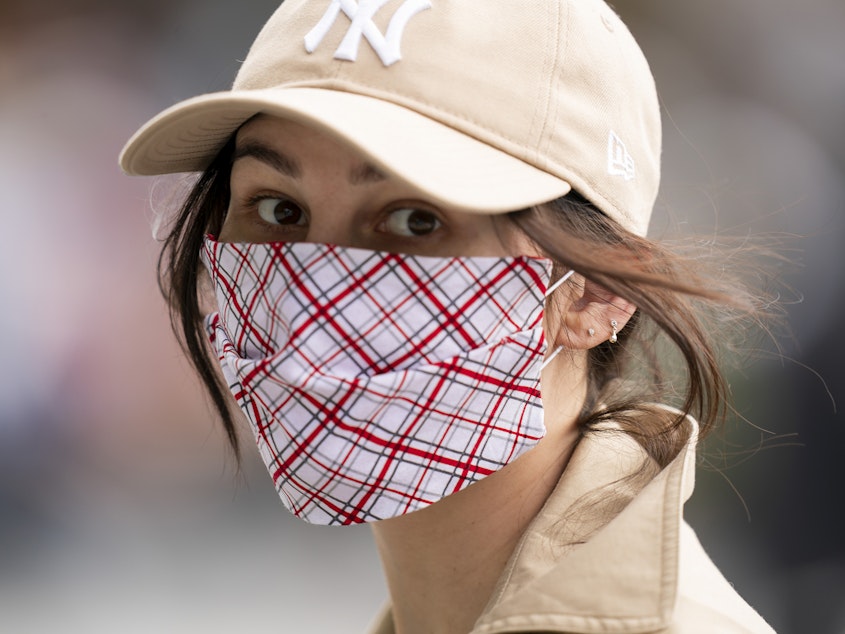 caption: The CDC says that when it comes to cloth masks, multiple layers made of higher thread counts do a better job of protecting the wearer.