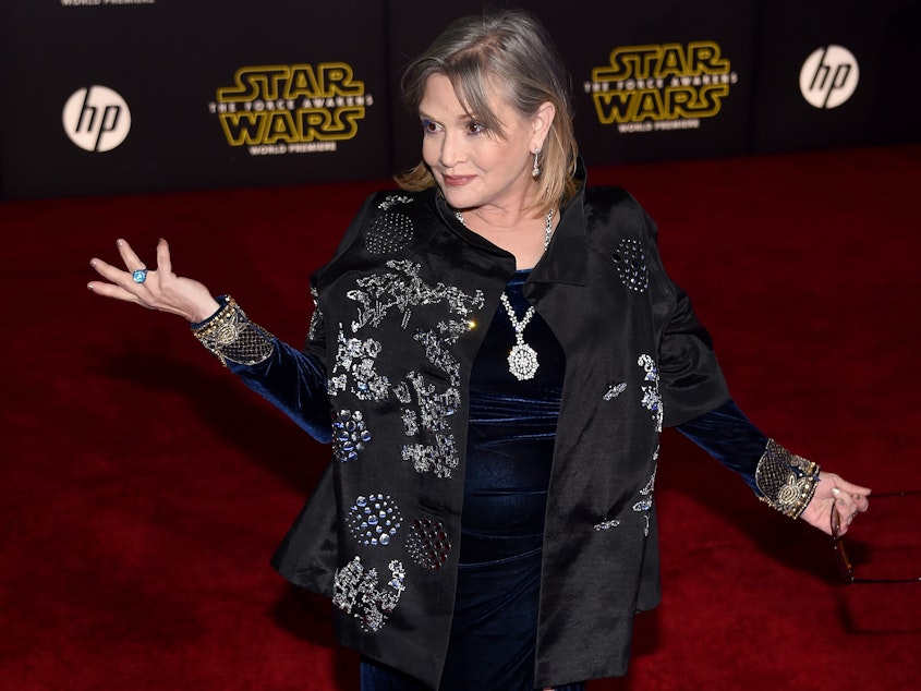 caption: Actress Carrie Fisher attends the premiere of <em>Star Wars: The Force Awakens</em> at the Dolby Theatre in Hollywood on Dec. 14, 2015. The late actress is being honored with a star on the Hollywood Walk of Fame on Thursday.