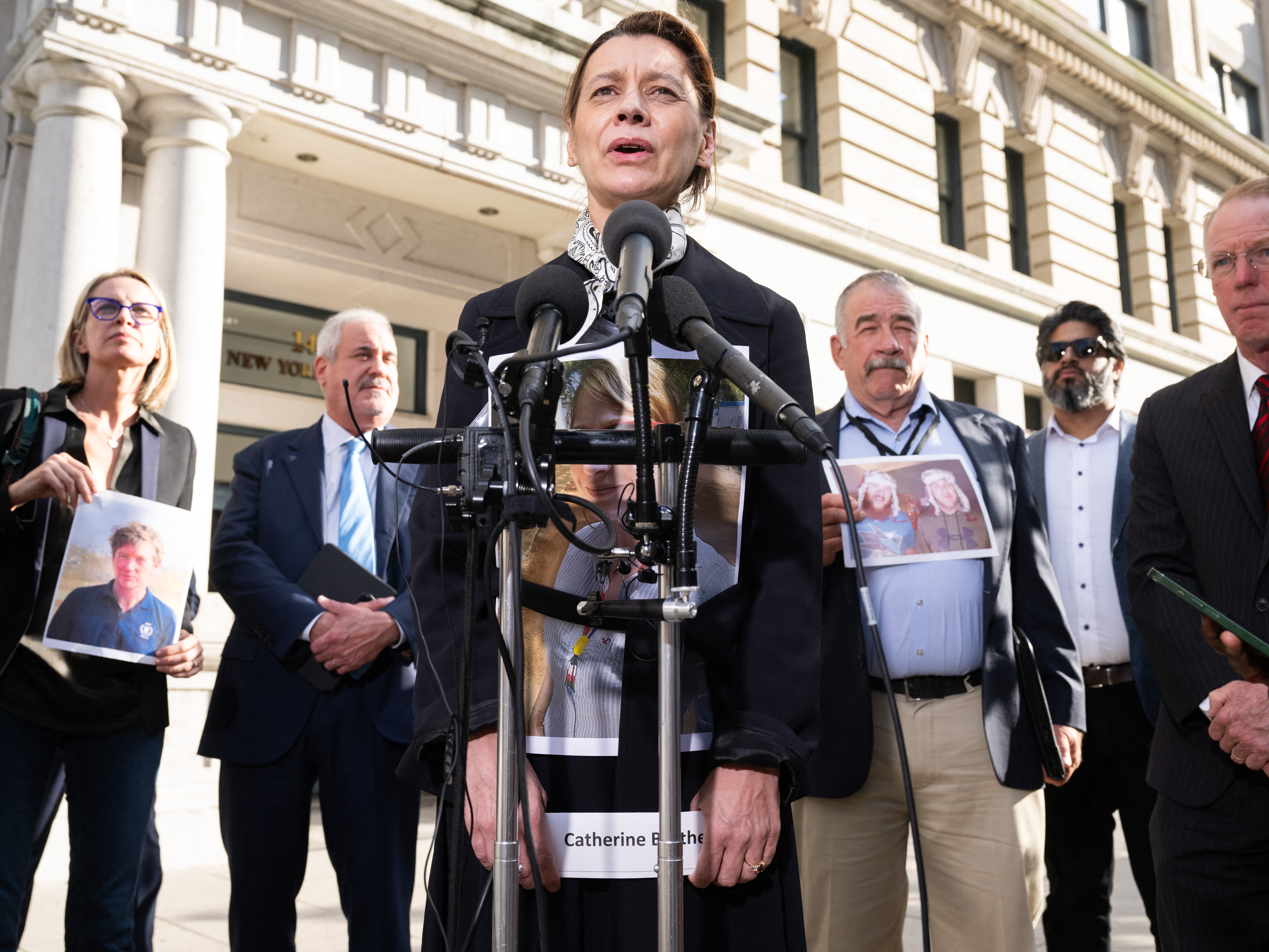 caption: Catherine Berthet of France, whose daughter Camille was killed in the 2019 crash of Ethiopian Airlines Flight 302, speaks Wednesday alongside other family members of victims after meeting with Justice Department officials.