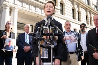 caption: Catherine Berthet of France, whose daughter Camille was killed in the 2019 crash of Ethiopian Airlines Flight 302, speaks Wednesday alongside other family members of victims after meeting with Justice Department officials.
