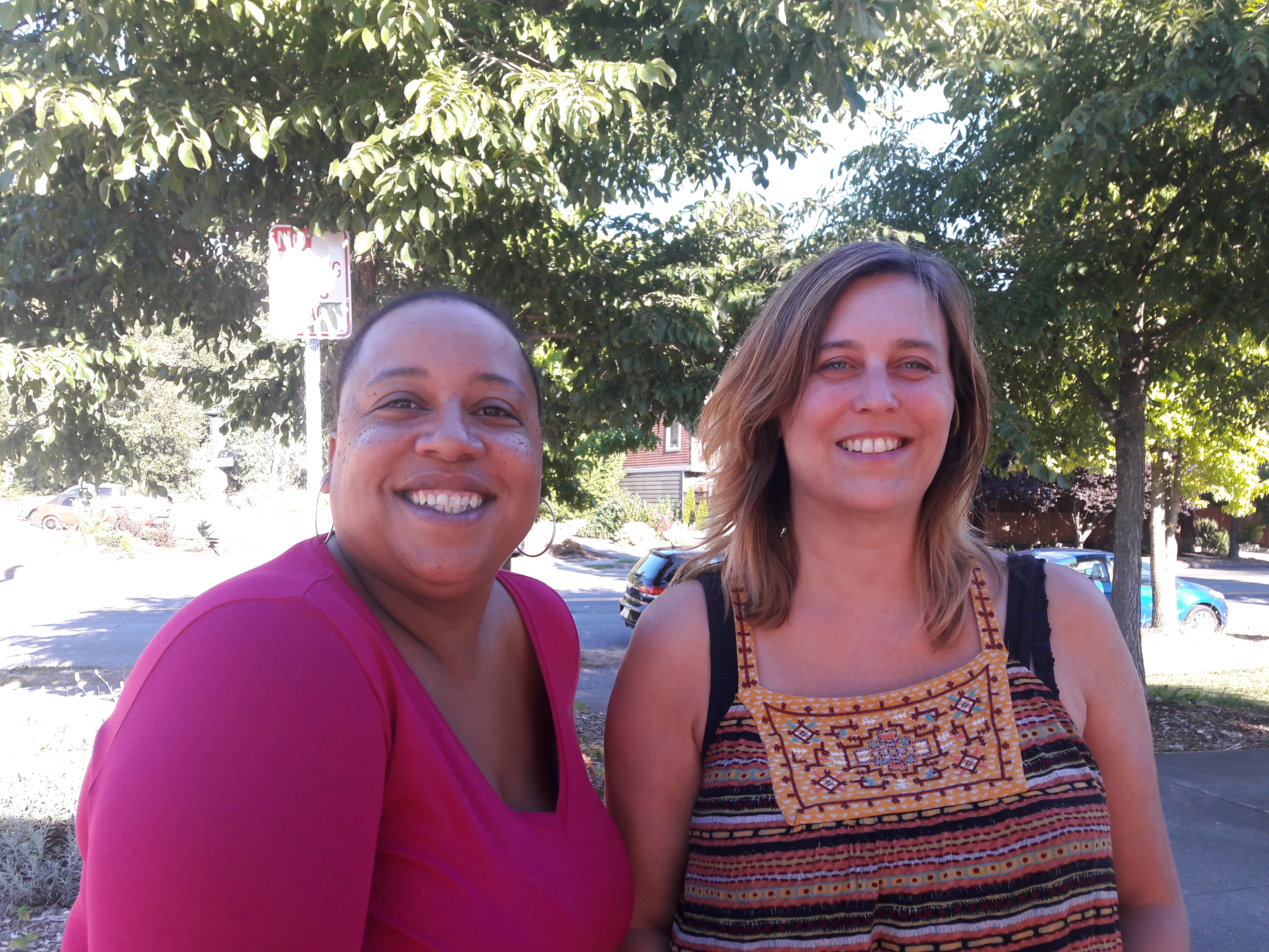 caption: Delridge residents Andrea Wilmot, left, and Ranette Iding are trying to start a grocery co-op in the neighborhood. The community has been struggling to make fresh produce more accessible.