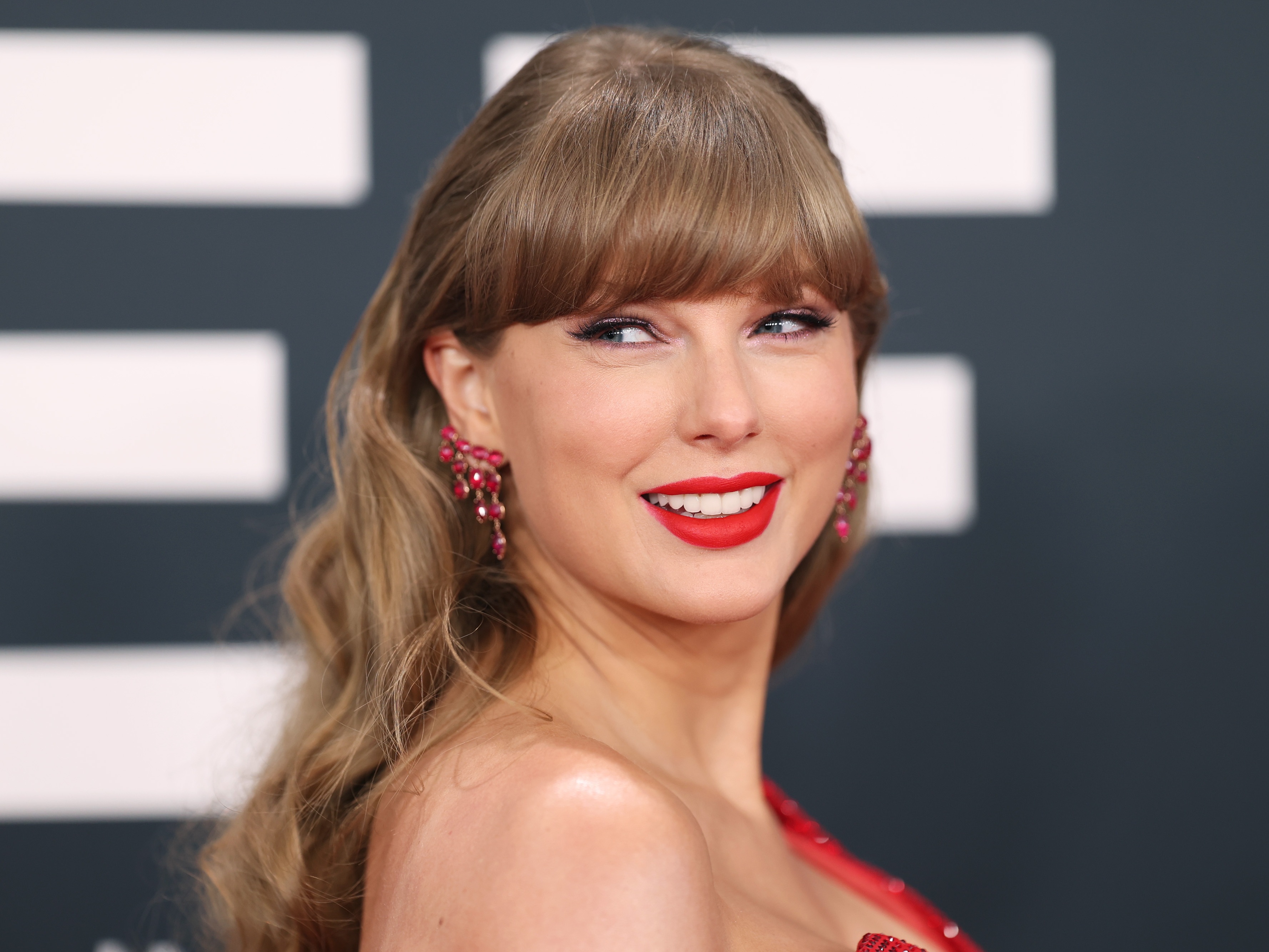 caption: Taylor Swift in February 2025, at the 67th Grammy Awards.