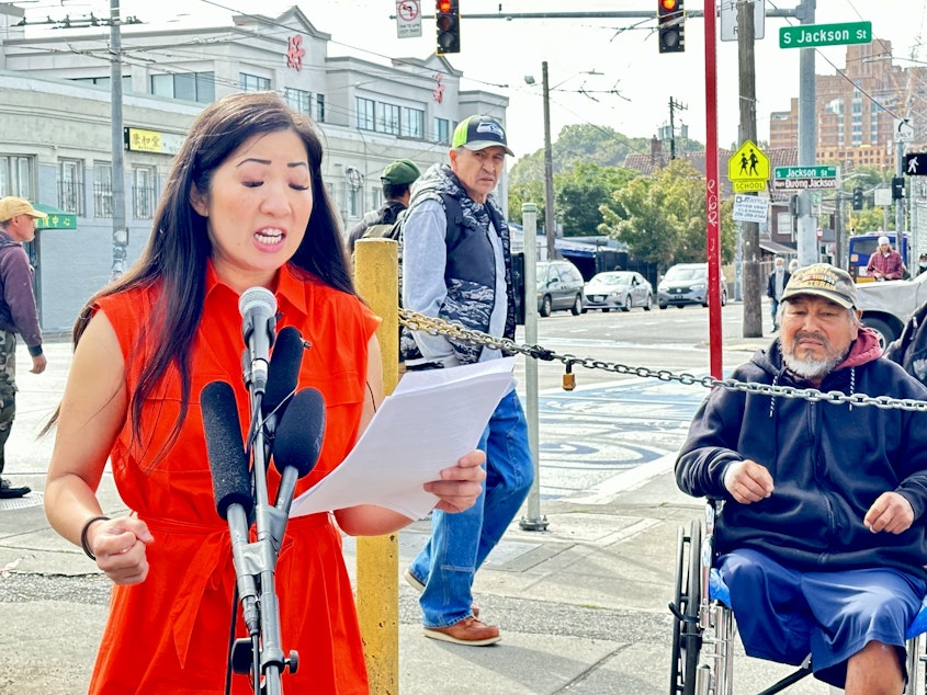 caption: City Council candidate Tanya Woo speaking about public safety in Seattle's Little Saigon neighborhood.