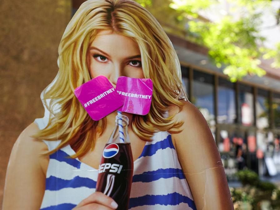 caption: A cardboard cutout of pop icon Britney Spears at a #FreeBritney protest held outside her conservatorship hearing on June 23 in Los Angeles.