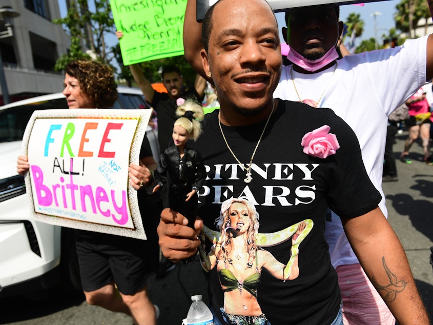 caption: #FreeBritney activists rally at the Stanley Mosk Courthouse in Los Angeles during the Britney Spears conservatorship hearing Wednesday.
