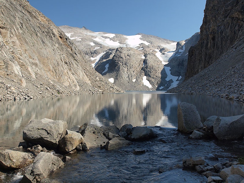 caption: Three small patches of Washington’s Hinman Glacier sit behind a newly formed lake in this 2009 photo along the crest of the Cascades.