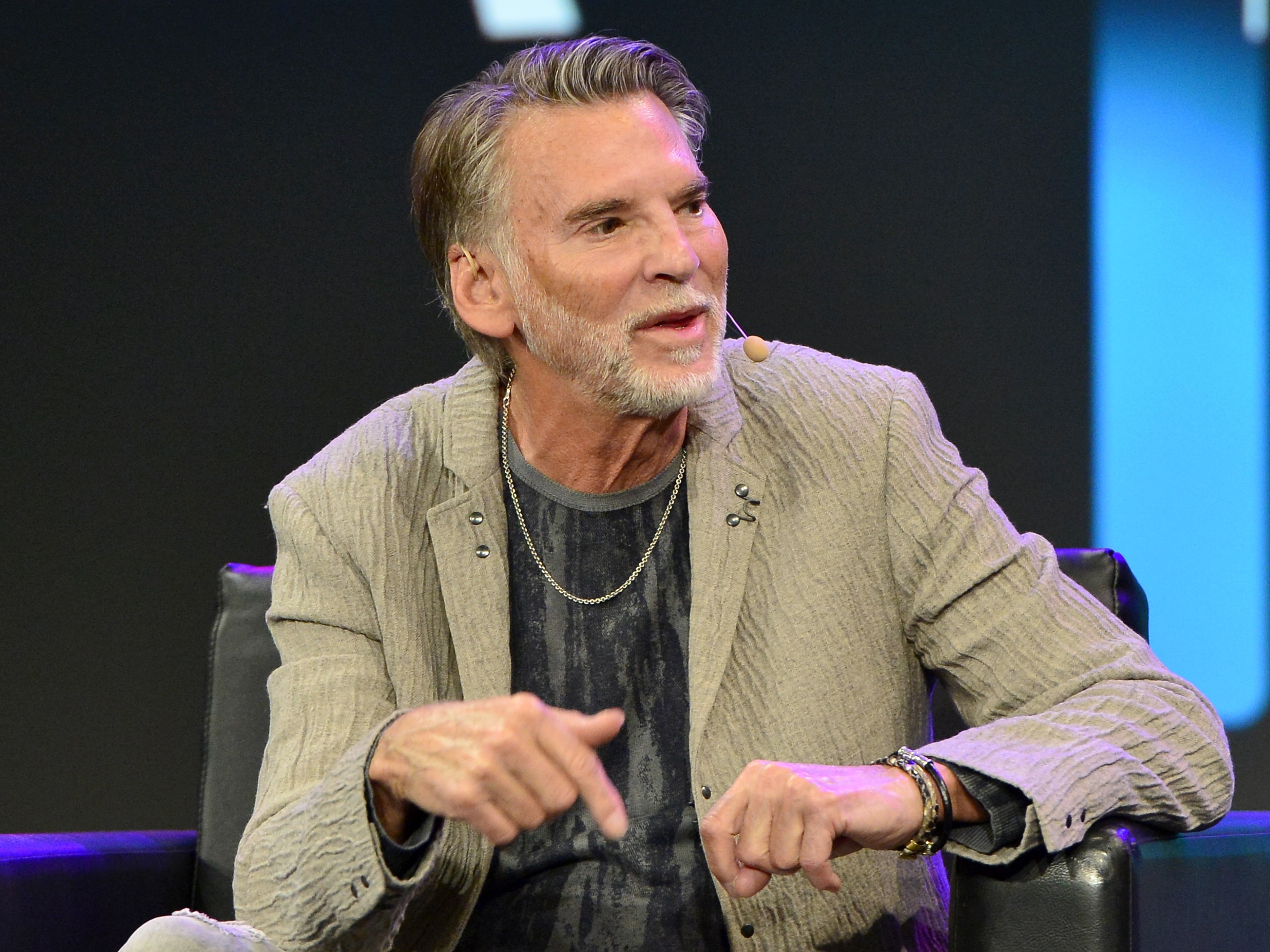 caption: Singer-songwriter Kenny Loggins, seen here in June 2022, is asking for his performance of the song "Danger Zone" to be deleted from an AI-generated "King Trump" video that the president posted to Truth Social on Saturday.