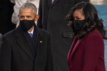 caption: Former President Barack Obama and former first lady Michelle Obama arrive at President Biden's inauguration.