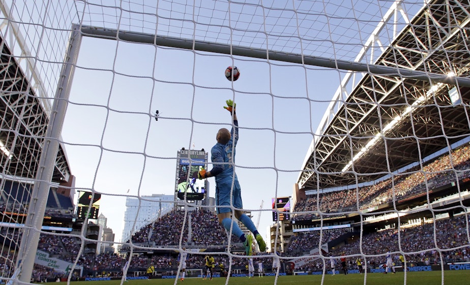 caption: United States goalie Brad Guzan leaps for a shot by Ecuador in the second half of a Copa America Centenario soccer match, Thursday, June 16, 2016 at CenturyLink Field in Seattle.