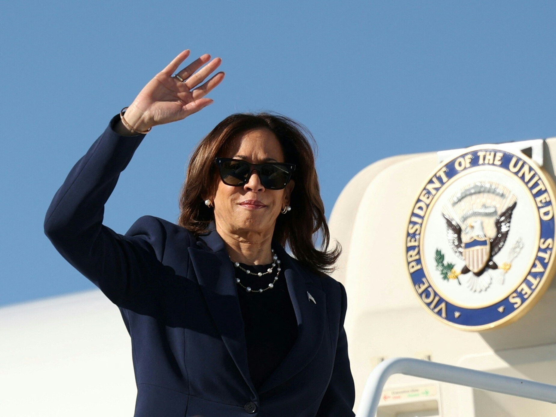 caption: Vice President Harris boards Air Force Two at Harry Reid International Airport in Las Vegas on Sept. 30, 2024.