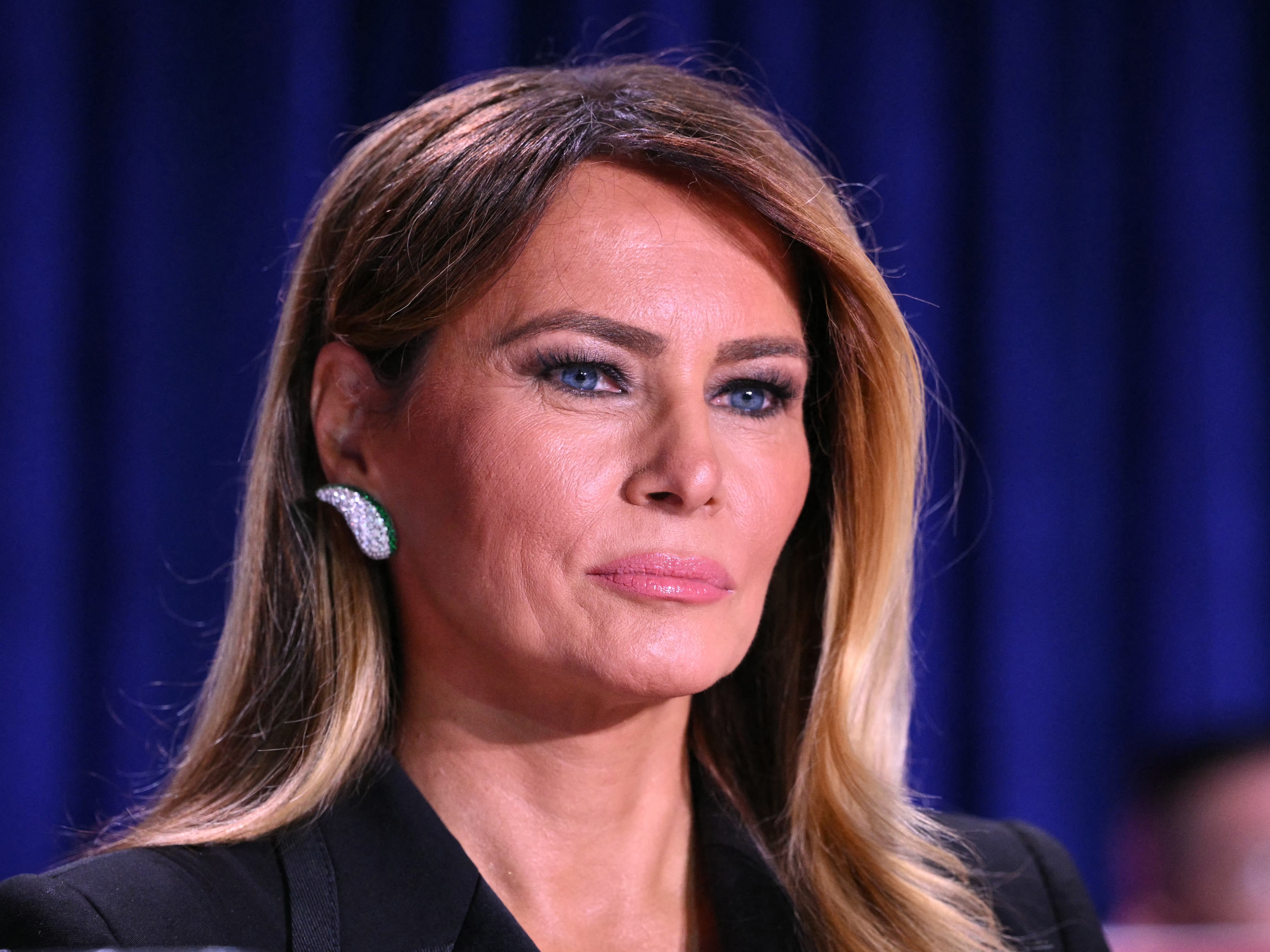 caption: First lady Melania Trump attends the White House Correspondents' Dinner at the Washington Hilton in Washington, D.C., on April 25.