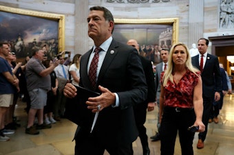caption: House Homeland Security Committee Chairman Mark Green, R-Tenn., Rep. Marjorie Taylor Greene, R-Ga., and their fellow Republican impeachment managers walk back through the U.S. Capitol Rotunda after transmitting articles of impeachment against Homeland Security Secretary Alejandro Mayorkas to the Senate on Tuesday.
